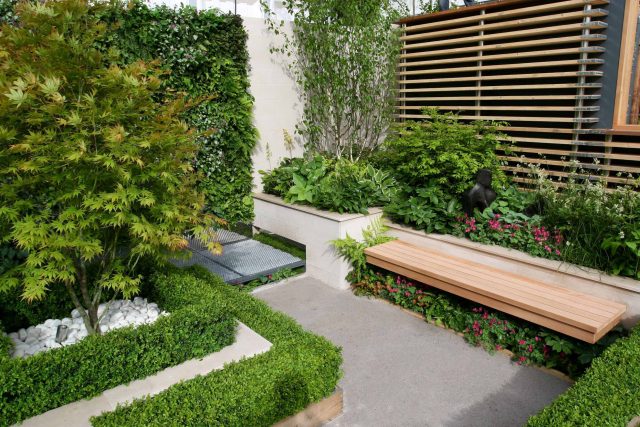 Award Winning Eco Chic Garden RHS Gold Medal 09 designed by Kate Gould constructed by The Garden Builders Chelsea Flower Show 2009 pergola hedging shrubs.