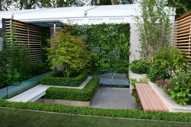 Award Winning Eco Chic Garden RHS Gold Medal 09 designed by Kate Gould constructed by The Garden Builders Chelsea Flower Show 2009 pergola hedging shrubs.