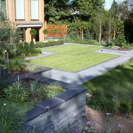 Stunning Family Garden designers Surrey APL Awards 09 Lynne Marcus Garden Design in Kingston Surrey Greater London area, water feature, sculptures, planting.