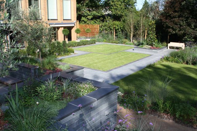 Stunning Family Garden designers Surrey APL Awards 09 Lynne Marcus Garden Design in Kingston Surrey Greater London area, water feature, sculptures, planting.