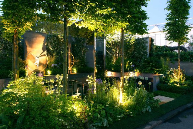 Award Winning RHS Silver Gilt Medal by Kate Gould, The Garden Builders RHS Chelsea Flower Show 2010, outdoor room, bio-gel fireplace, concrete chimney.