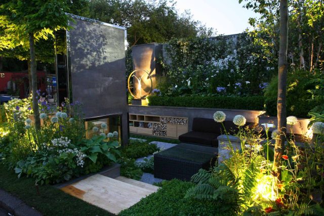 Award Winning RHS Silver Gilt Medal by Kate Gould, The Garden Builders RHS Chelsea Flower Show 2010, outdoor room, bio-gel fireplace, concrete chimney.