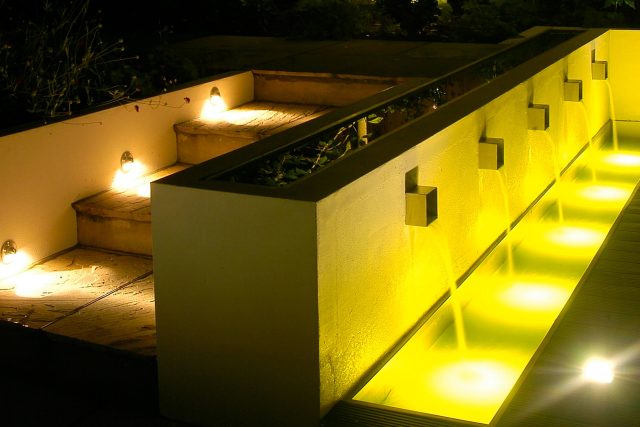 Family Garden Kent designed by Andy Sturgeon creates this Bickley garden constructed to provide a contemporary backdrop to the evergreen hedging planting.