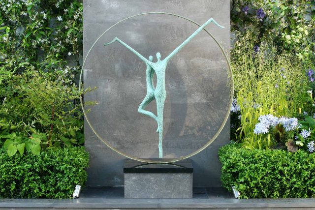 Award Winning RHS Silver Gilt Medal by Kate Gould, The Garden Builders RHS Chelsea Flower Show 2010, outdoor room, bio-gel fireplace, concrete chimney.