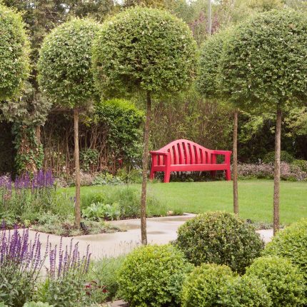 Stunning Suburban Garden constructed in Hampstead by Lynne Marcus also with Hunza exterior lighting illuminates asymmetrical landscape design, stone terrace.