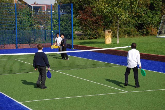 Play Zone designed by Nigel Abbey Design and landscaped by The Garden Builders, running track, play surfaces, football pitch basket ball court play zone design.