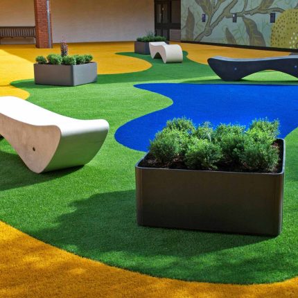School playground garden design for primary school courtyard development in London, learning and teaching environment landscaping commercial contractors London.