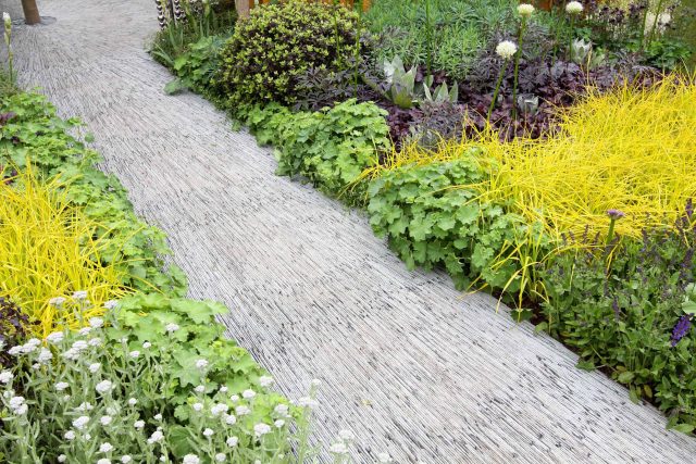 Award winning garden 2013 RHS Silver Gilt Medal at Chelsea Flower Show Garden, The Garden Builders Darren Hawkes Designer, opaque glass screens, steel balls.