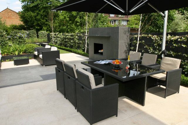Family garden Barnes receives Highly Commended at Garden Design award with Declan Buckley in London, multi-functional outdoor environment cooking, dining, play.