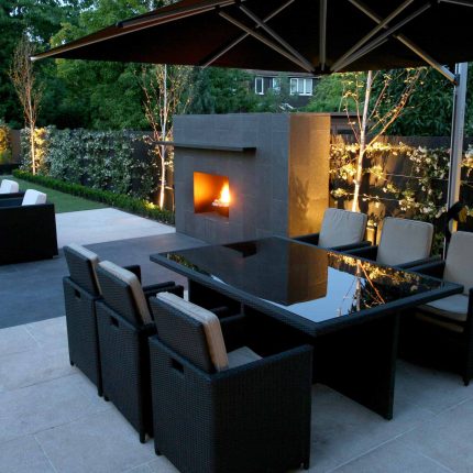 Family garden Barnes receives Highly Commended at Garden Design award with Declan Buckley in London, multi-functional outdoor environment cooking, dining, play.