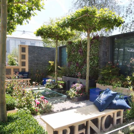 Large city garden design space for a grand house by Kate Gould, Magistrates Garden RHS 2011 Silver Gilt outdoor relaxing space, curved bench, water feature.