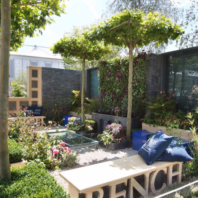 Large city garden design space for a grand house by Kate Gould, Magistrates Garden RHS 2011 Silver Gilt outdoor relaxing space, curved bench, water feature.