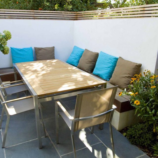Contemporary small family garden designers in Clapham SW4 slate paving by Garden Builders London contractors near me, multi-purpose outdoor space, slate paving.