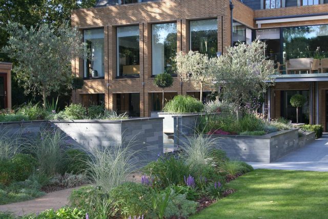 Stunning Family Garden designers Surrey APL Awards 09 Lynne Marcus Garden Design in Kingston Surrey Greater London area, water feature, sculptures, planting.
