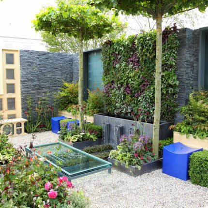 Large city garden design space for a grand house by Kate Gould, Magistrates Garden RHS 2011 Silver Gilt outdoor relaxing space, curved bench, water feature.