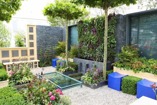 Large city garden design space for a grand house by Kate Gould, Magistrates Garden RHS 2011 Silver Gilt outdoor relaxing space, curved bench, water feature.