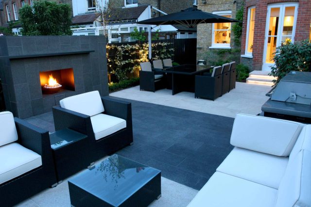 Family garden Barnes receives Highly Commended at Garden Design award with Declan Buckley in London, multi-functional outdoor environment cooking, dining, play.