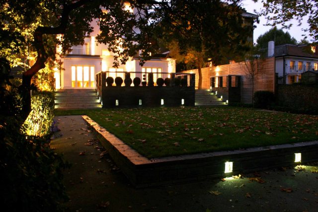 Stylish Formal Garden with terrace receives Highly Commended by Phil Frank in St John's Wood London slatted trellis panels gravel resin paths, children's play.