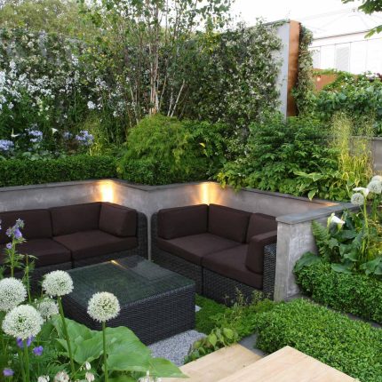 Award Winning RHS Silver Gilt Medal by Kate Gould, The Garden Builders RHS Chelsea Flower Show 2010, outdoor room, bio-gel fireplace, concrete chimney.