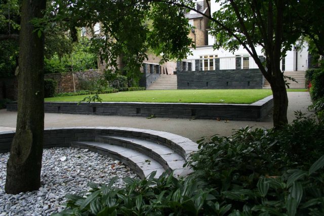 Stylish Formal Garden with terrace receives Highly Commended by Phil Frank in St John's Wood London slatted trellis panels gravel resin paths, children's play.