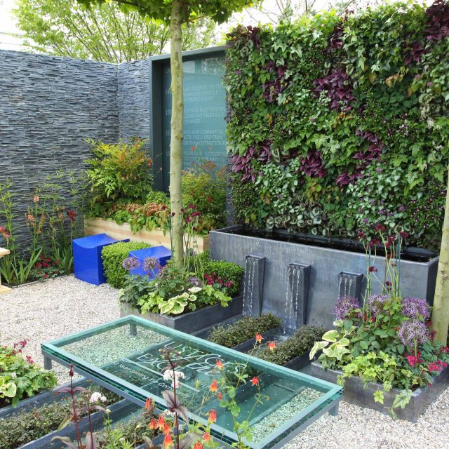 Large city garden design space for a grand house by Kate Gould, Magistrates Garden RHS 2011 Silver Gilt outdoor relaxing space, curved bench, water feature.