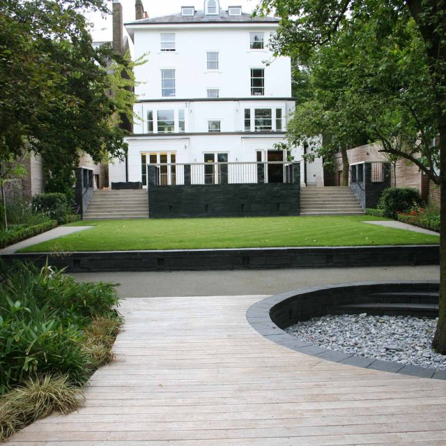 Stylish Formal Garden with terrace receives Highly Commended by Phil Frank in St John's Wood London slatted trellis panels gravel resin paths, children's play.