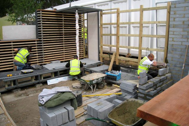 Award Winning Eco Chic Garden RHS Gold Medal 09 designed by Kate Gould constructed by The Garden Builders Chelsea Flower Show 2009 pergola hedging shrubs.
