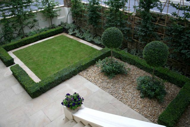 Contemporary garden with formal planting design with resin bonded gravel paths, St Johns Wood, modern family garden accentuated by formal planting, resin path.