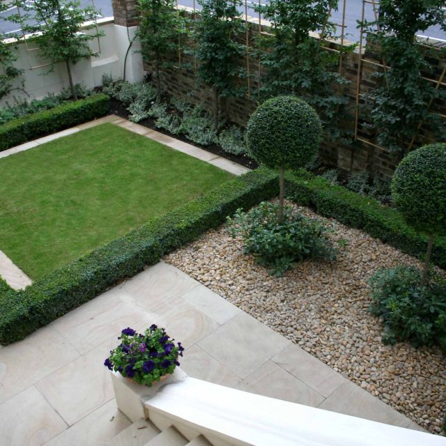 Contemporary garden with formal planting design with resin bonded gravel paths, St Johns Wood, modern family garden accentuated by formal planting, resin path.