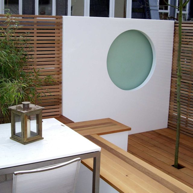 Tranquil small garden Hampstead by Andy Sturgeon small garden designs modern masterpiece by Gold medal winning designer modern masterpiece Gold medal winner.