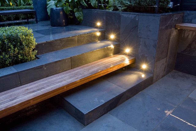 Uncomplicated Contemporary Design in Kensington London designed by award winning Declan Buckley, attractive design terrace entertaining relaxation zone planting.