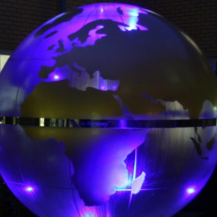 Garden Design Sphere Water Feature set in the courtyard of a London Hospital dynamic steel water feature a clear acrylic sphere included map of the world.
