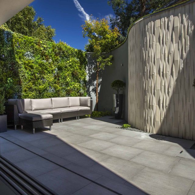 Small Courtyard Garden, The idea was to create an interesting blend of vertical finishes that work together to give a different feel when viewed both internally.