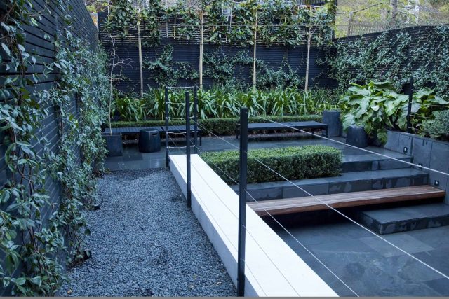 Uncomplicated Contemporary Design in Kensington London designed by award winning Declan Buckley, attractive design terrace entertaining relaxation zone planting.