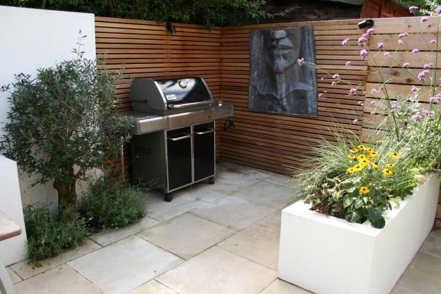Outdoor garden entertainment space Battersea relaxation zone designed and constructed by The Garden Builders landscaping contractors, specialist designers.