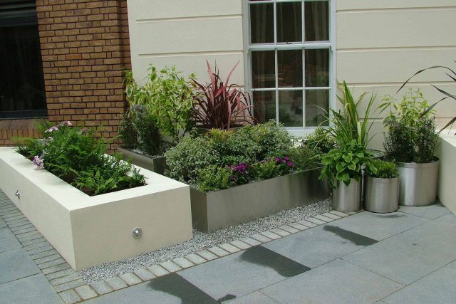 Courtyard style Garden for Private BankStride Stride Treglown Architects and constructed by Garden Builders commercial landscape designers specialists London.