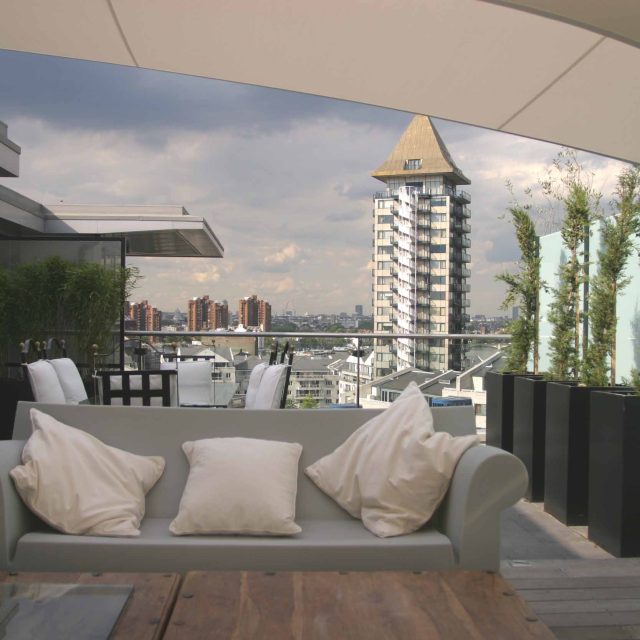 Multi levelled roof garden terrace design long narrow shape by Garden Builders at Imperial Wharf landscaping consultant contractors specialising roof gardens.