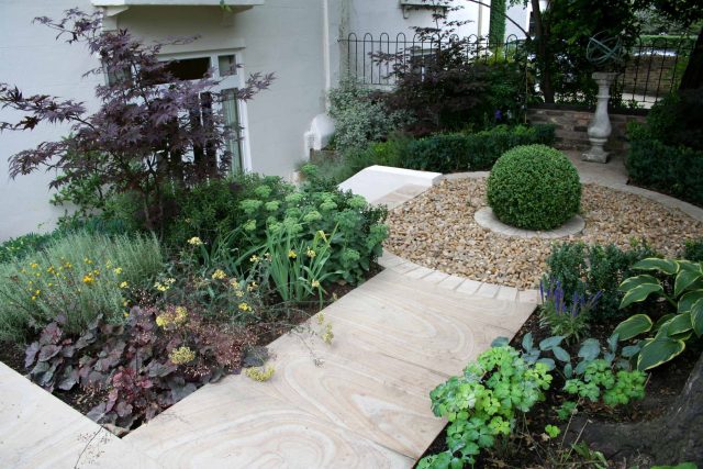 Contemporary garden with formal planting design with resin bonded gravel paths, St Johns Wood, modern family garden accentuated by formal planting, resin path.