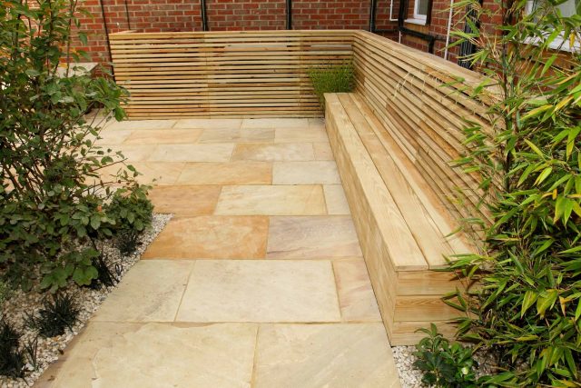 Courtyard garden for NHS GP Practice Balham Surgery south London with water feature and lighting, landscaping consultant contractors lighting, planting.
