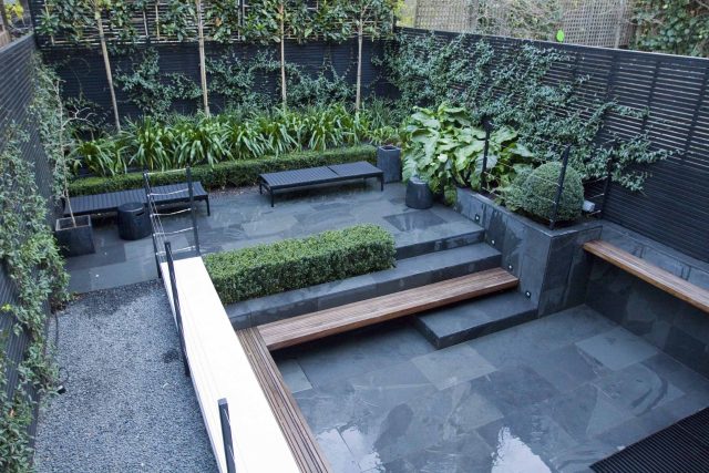 Uncomplicated Contemporary Design in Kensington London designed by award winning Declan Buckley, attractive design terrace entertaining relaxation zone planting.