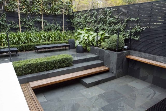 Uncomplicated Contemporary Design in Kensington London designed by award winning Declan Buckley, attractive design terrace entertaining relaxation zone planting.