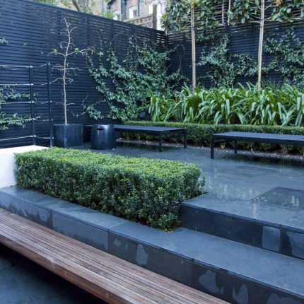 Uncomplicated Contemporary Design in Kensington London designed by award winning Declan Buckley, attractive design terrace entertaining relaxation zone planting.