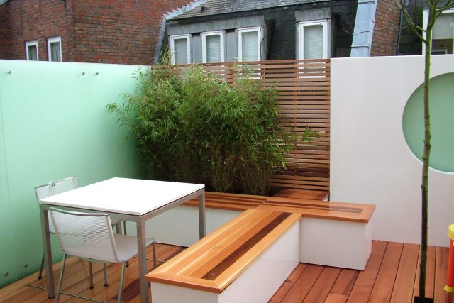 Tranquil small garden Hampstead by Andy Sturgeon small garden designs modern masterpiece by Gold medal winning designer modern masterpiece Gold medal winner.