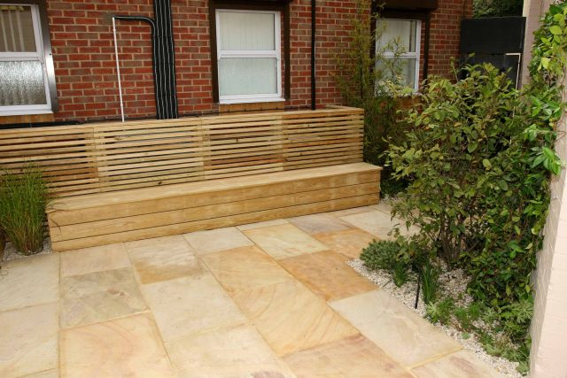 Courtyard garden for NHS GP Practice Balham Surgery south London with water feature and lighting, landscaping consultant contractors lighting, planting.
