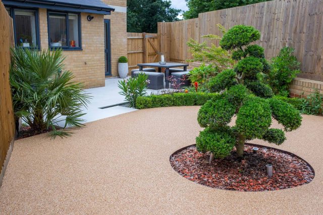 Japanese style garden, designed and constructed by The Garden Builders floor levels and planting geometry white porcelain tiles landscape company wood decking.