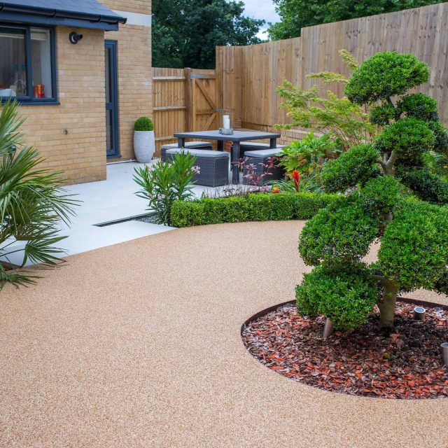 Japanese style garden, designed and constructed by The Garden Builders floor levels and planting geometry white porcelain tiles landscape company wood decking.