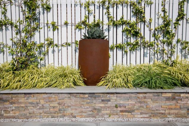 Garden Design Highgate North London Garden Designer Landscape Contractor, complimentary family style garden planting scheme also consisting diagonal brickwork.