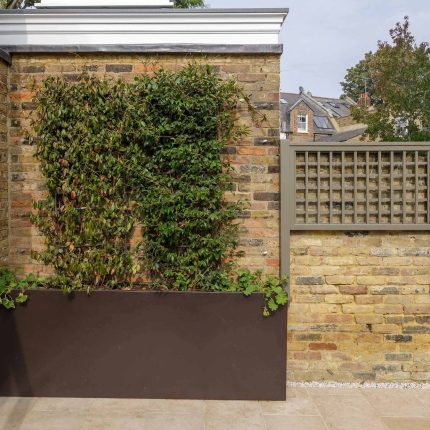 Elegant airy west London traditional contemporary garden by designer Camilla Hiley, urban with rustic country touches landscaping specialists in planting.