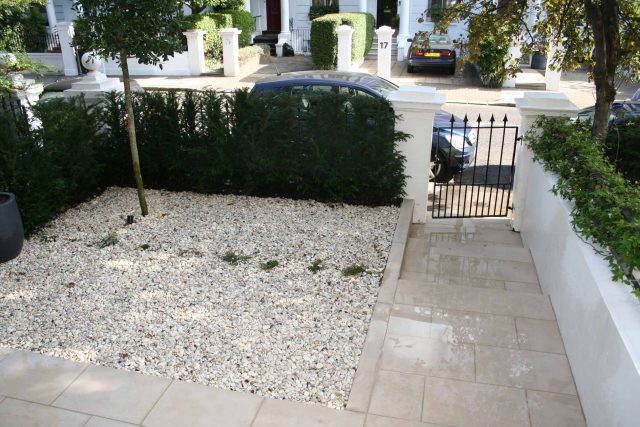 Garden Designer Chelsea Chic Modern Refinement Charm Landscape Contractor with steps sleek lines and flooring was laid with white limestone by Declan Buckley.