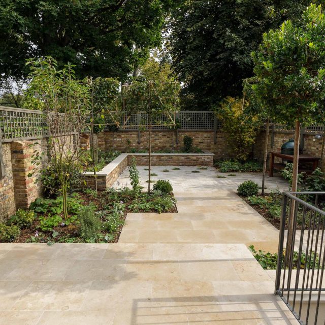 Elegant airy west London traditional contemporary garden by designer Camilla Hiley, urban with rustic country touches landscaping specialists in planting.